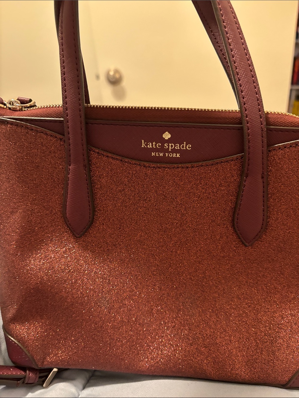 Kate Spade wine/burgundy shimmer crossbody small bag